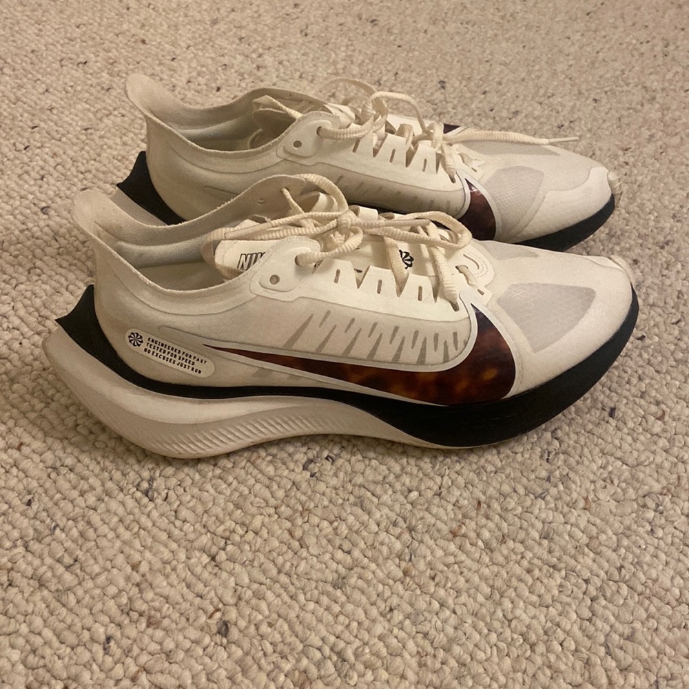 Nike with tortoise shell swoosh